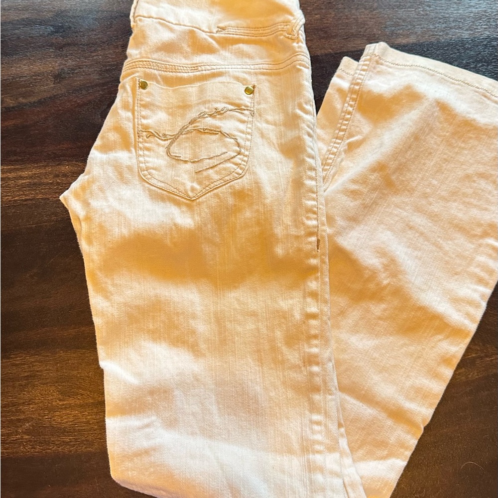 White denim. In gently used condition.